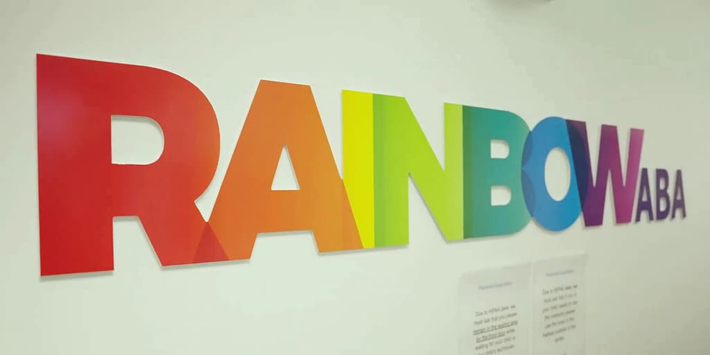 The Rainbow ABA sign on the wall of the Bloomfield center