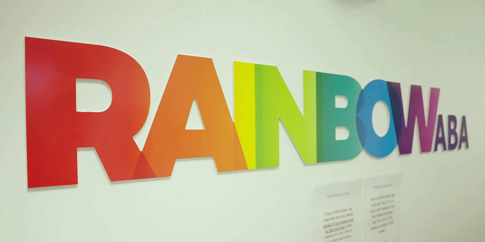 The Rainbow ABA sign on the wall of the Bloomfield center